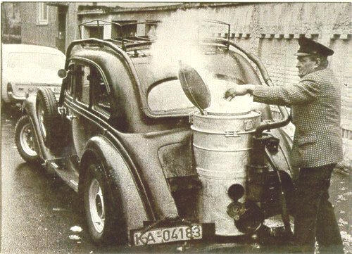Image: Filling the tank of a wood gas vehicle.