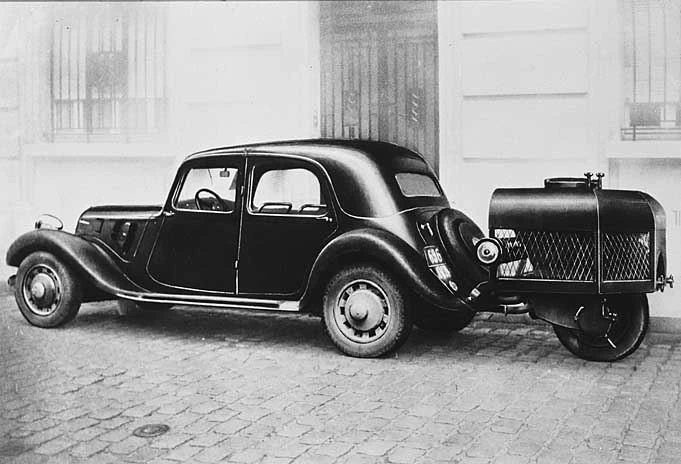 Image: A vehicle powered by a woodgas trailer.