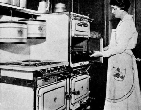 A Chambers Fireless Cooking Gas Range from the 1910s. The insulated hoods were lowered over the burners.