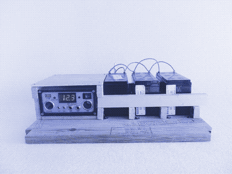 The solar charge controller and half of the home office battery storage. Image by Adriana Parra.