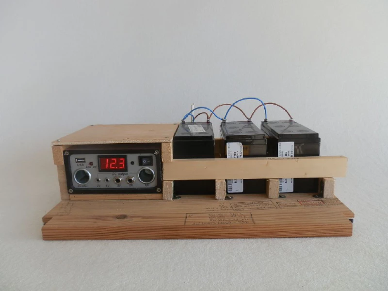 The solar charge controller and half of the home office battery storage. Image by Adriana Parra.