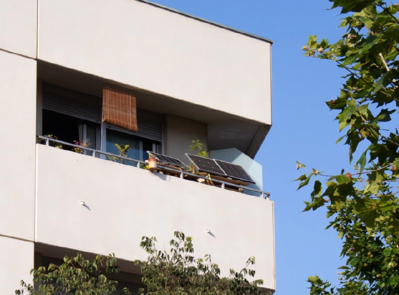 Image: To the right on the balcony are the two 50W solar panels that power my flat&rsquo;s living room. Next to it is the 30W solar panel that makes this website work. Photo: Marie Verdeil.