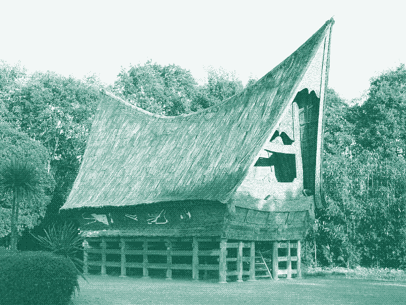Image: A traditional Batak house in Indonesia, designed to maximize passive cooling and natural ventilation in a warm and humid climate. The thatched roof insulates against solar heat gains, while the high ceiling and the building’s orientation to the prevailing wind direction facilitate the removal of hot air. Photo credit: Mr. Wabu (CC BY-SA 2.0).