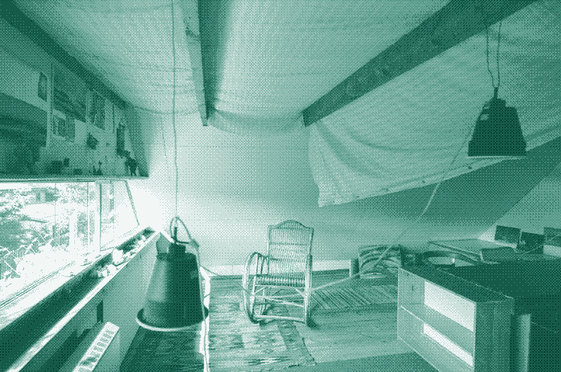 Image: Hanging an eiderdown beneath the roof of the Oskar and Zofia Hansen House in Szumin. Photograph by Michał Matejko, 2020.