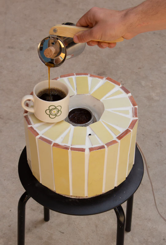 Image: Serving solar-powered coffee. Photo by Marie Verdeil.