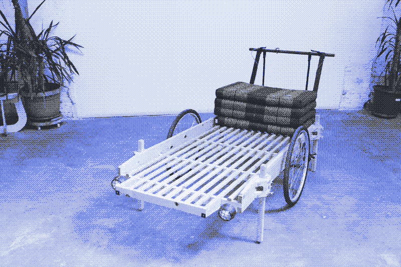 Images: A foldable sleeping mattress on the handcart. Photos by Kris De Decker.