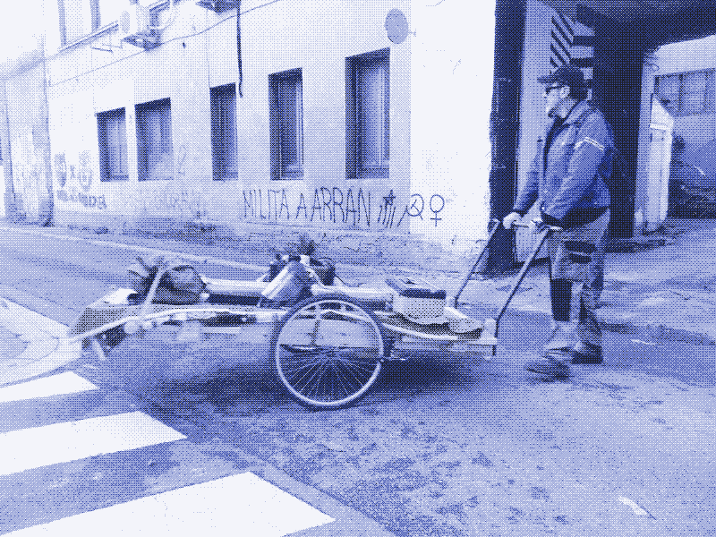 Image: Guilhem Senges, who built the vehicle&rsquo;s metal parts, pushes the handcart to a welding job a few streets up in the neighborhood.